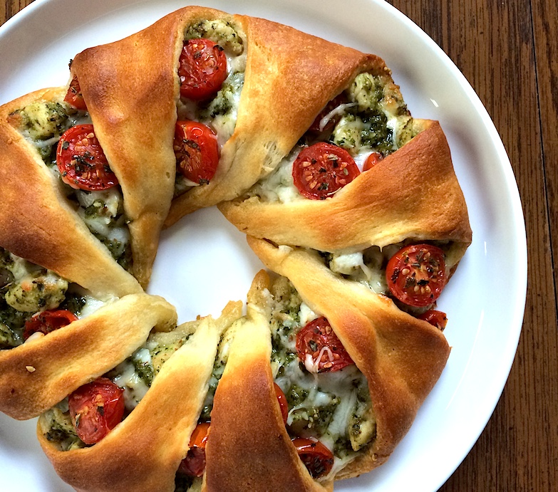 Cheesy Pesto Chicken Crescent Wreath With Roasted Cherry Tomatoes Indulgent Eats Dining Recipes Travel