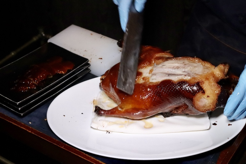 Mott 32 Peking Duck Being Carved - Best Hong Kong Restaurants - Photo by Indulgent Eats