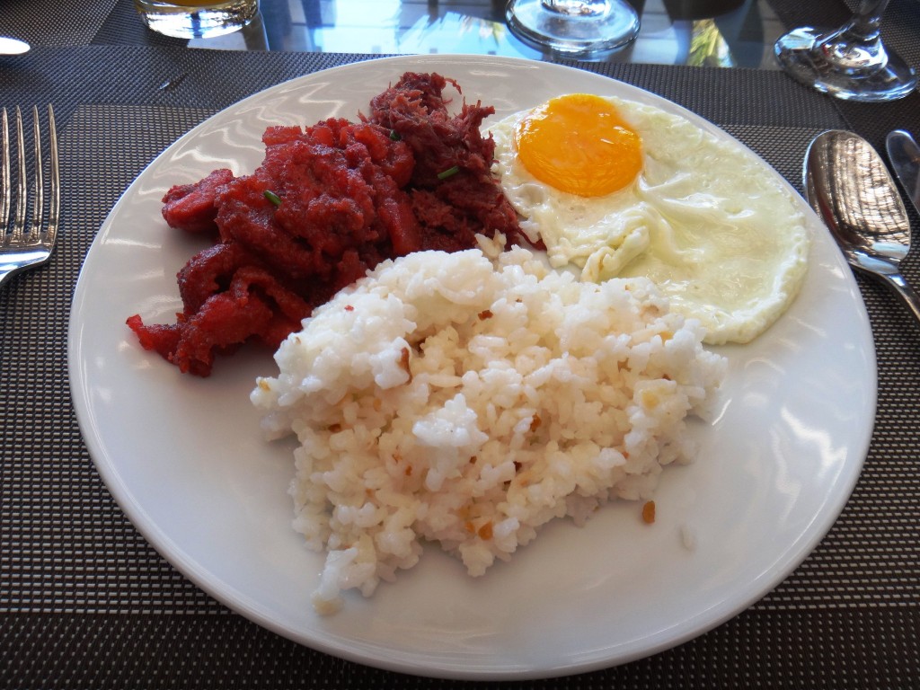 Filipino Breakfast - Tocilog (Cured pork tocino with garlic fried rice and a fried egg)