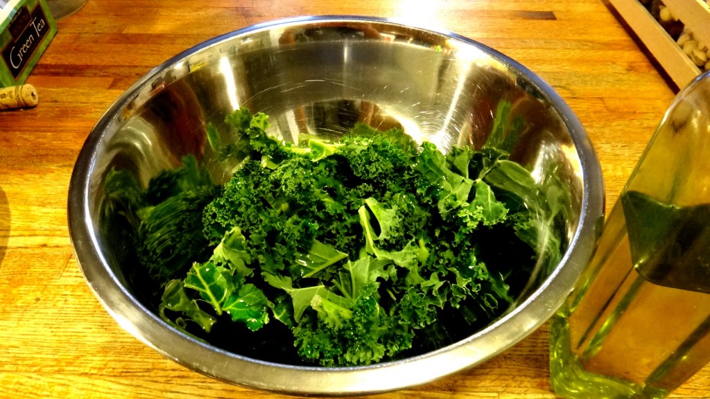 Homemade Crispy Kale Chips: Prep the kale in a large bowl