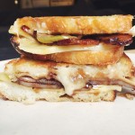 Rosemary Candied Bacon Grilled Cheese with Balsamic Apples Sliced Side View