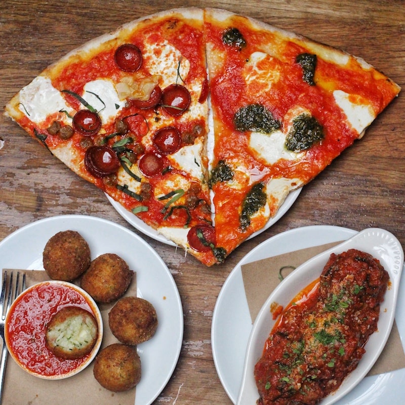 Best NYC Restaurants - Rubirosa Tie Dye Pizza Arancini Meatballs - Photo by Indulgent Eats